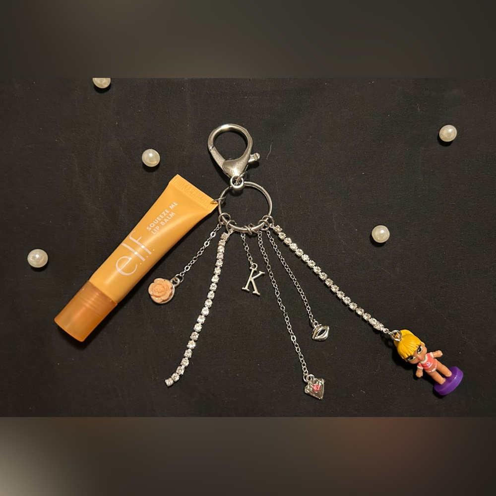 ELF Orange Lip Balm, mini baby Bratz(Fianna) Silver Charms and with “K” initial